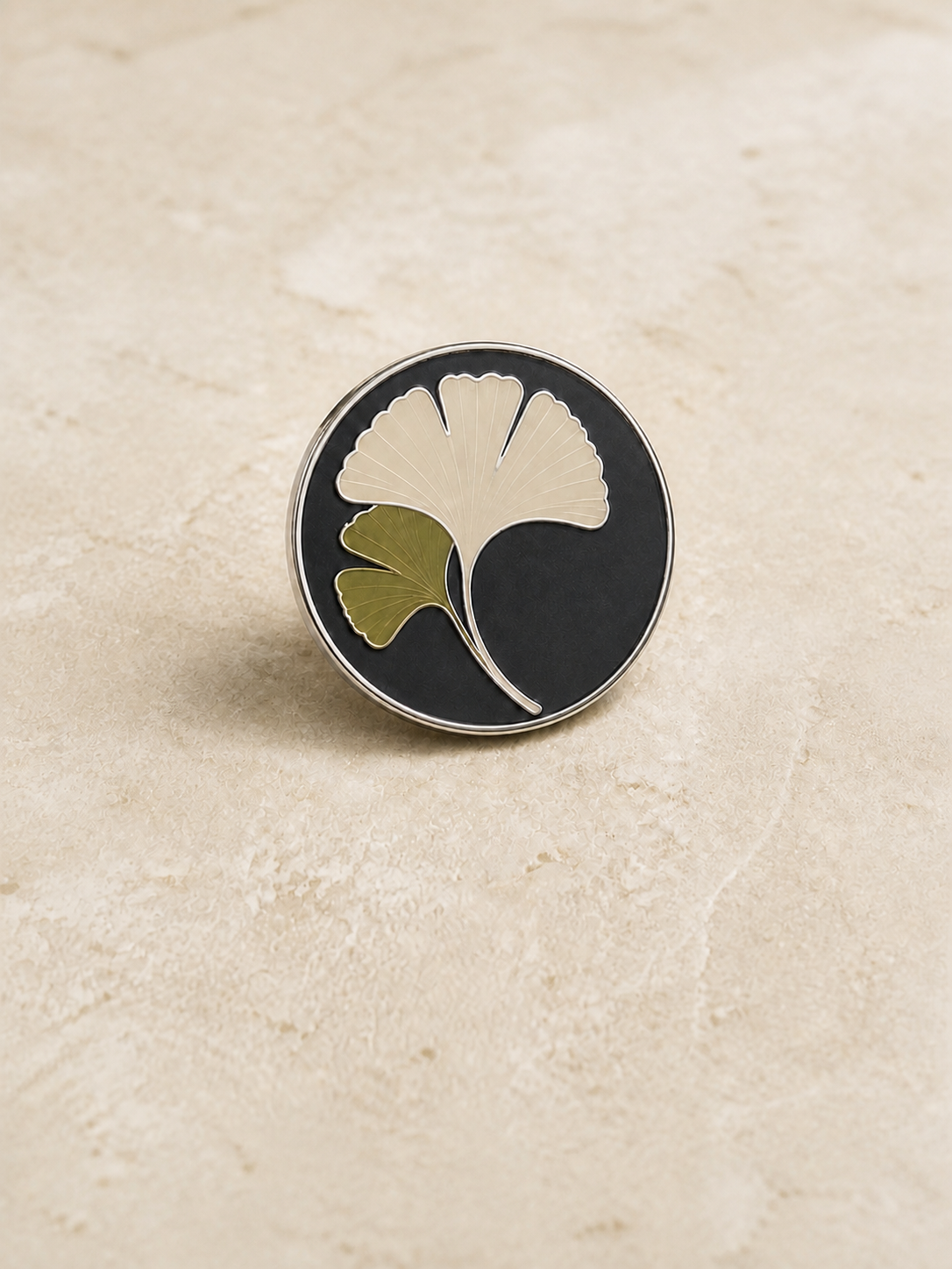 Complete round custom hard enamel ginkgo pin with a flat polished face
